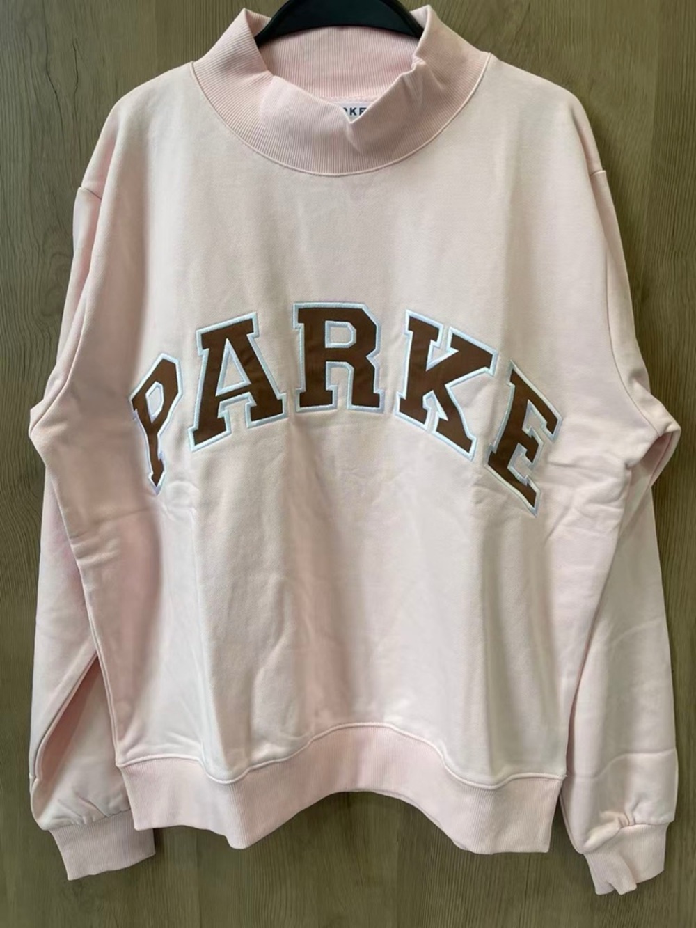 Parke Women's Soft Light Pink Crewneck Sweatshirt with Brown Lettering